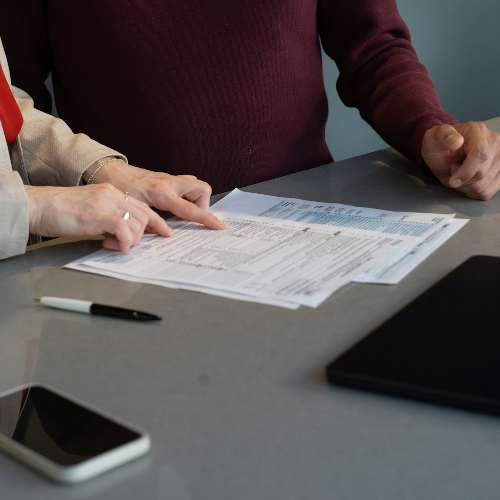 Reviewing paperwork at a table